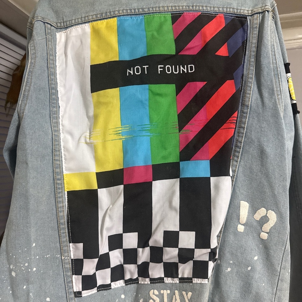 Jean jacket with patches on front/back